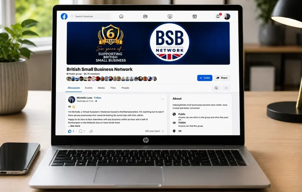 British Small Business Network Facebook group displayed on a laptop in a modern workspace.